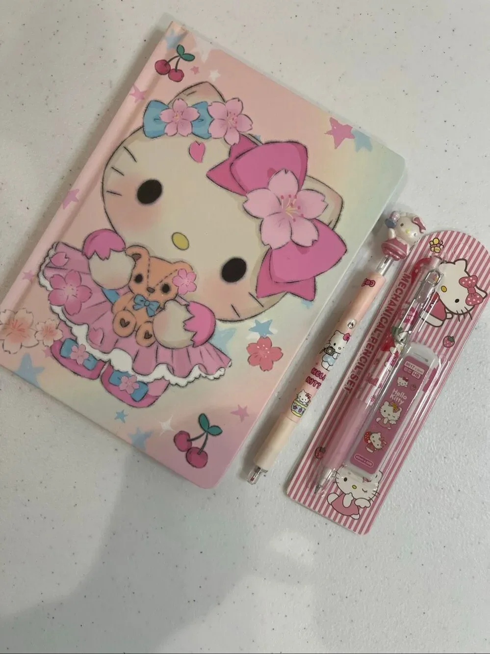Hello Kitty hard cover journal decorative pages pen and pencil included